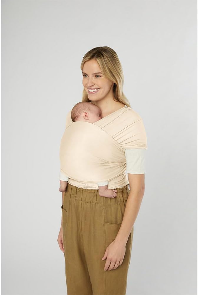 Ergobaby Canguru para bebês desde o nascimento até 11,3 kg, modelo Aura Knit, feito com tecidos reciclados, elástico e respirável, unissex, cor creme.