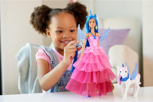 Juguete Barbie Unicornio, muñeca conmemorativa del 65 cumpleaños con pelo azul, vestido rosa y accesorios como alas de zafiro y mascota alicornio, HRR16