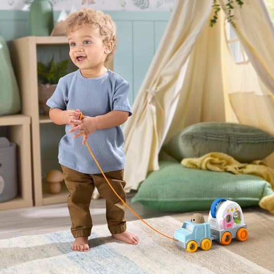 Fisher-Price Brinquedo para bebês e crianças pequenas: Veículo de reboque Friendship Forest com atividades sensoriais para bebês a partir de 1 ano de idade, JKD52