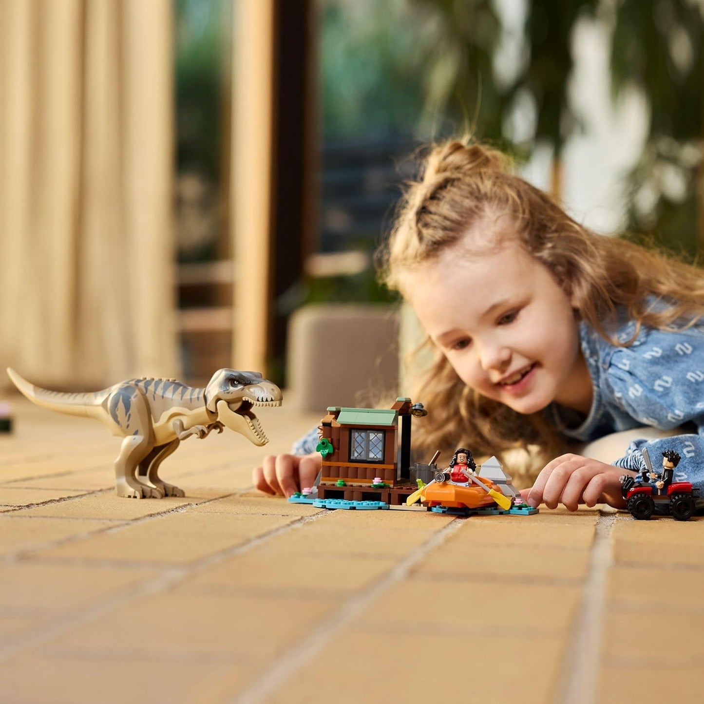 LEGO Jurassic World Fuga do T. rex no Rio - Brinquedo Interativo de Dinossauro - Inclui uma Figura de Dinossauro, Barco de Brinquedo, Quadriciclo e 2 Minifiguras - Presente para Meninos e Meninas a partir de 5 Anos - 76975