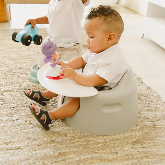 Asiento Bumbo con bandeja de apoyo para bebés – Asientos para bebés para sentarse hasta 6 meses o más – Asiento de piso para bebés Cool Grey