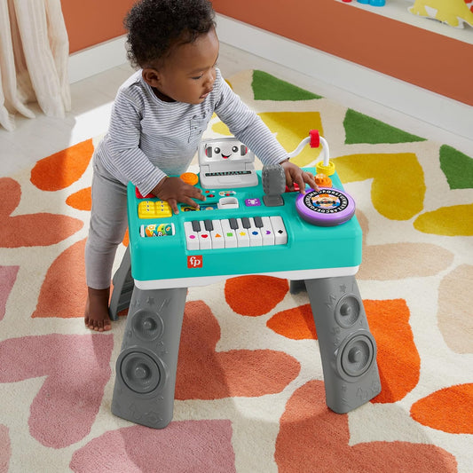 Fisher-Price Aprenda a tocar DJ com mesa, brinquedo musical educativo com luzes e sons, versões em italiano, castelhano, português e inglês, HXG08