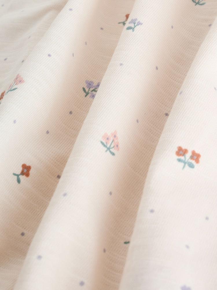 |BabyGirl| Conjunto Com 3 Macacões Florais Lilás e Cru Com Babados Nos Ombros