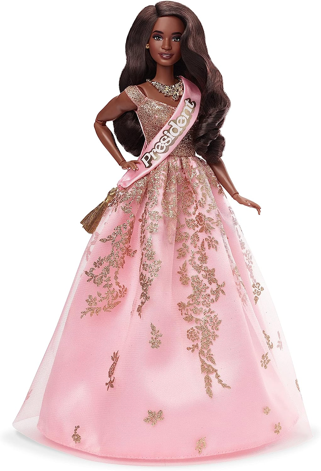 Barbie O Filme, presidente Barbie colecionável usando vestido rosa brilhante e dourado com faixa, HPK05