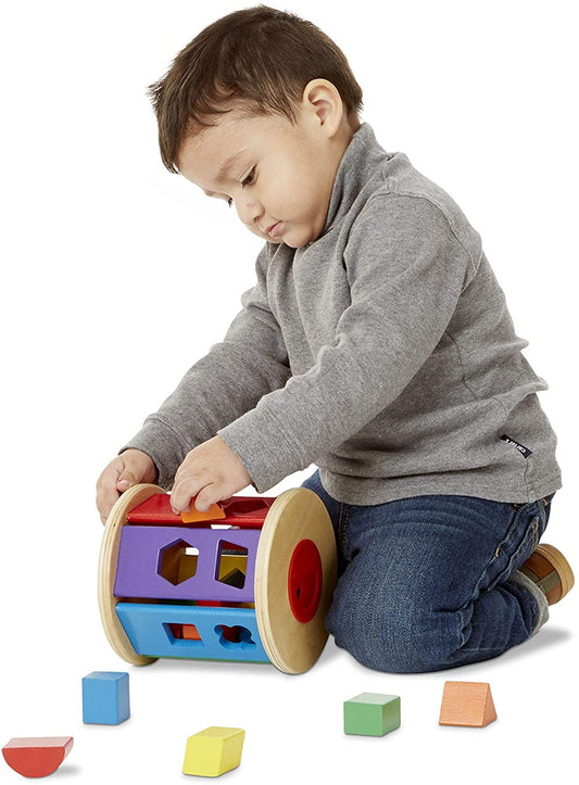 Melissa & Doug Match & Roll Shape Sorter - Juguete para el desarrollo y las habilidades motoras