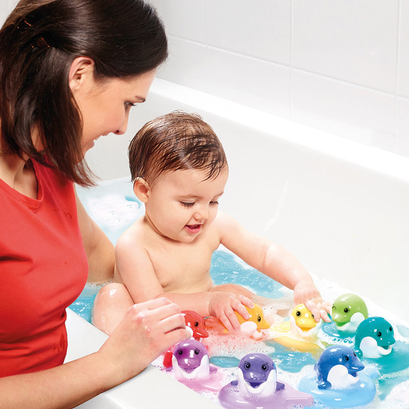 Tomy - Golfinhos Flutuantes Brinquedo de Banho
