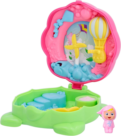CRY BABIES Little Changers Windy Cápsula colecionável em forma de Flor que inclui uma mini boneca, uma pipeta e um folheto +3 anos