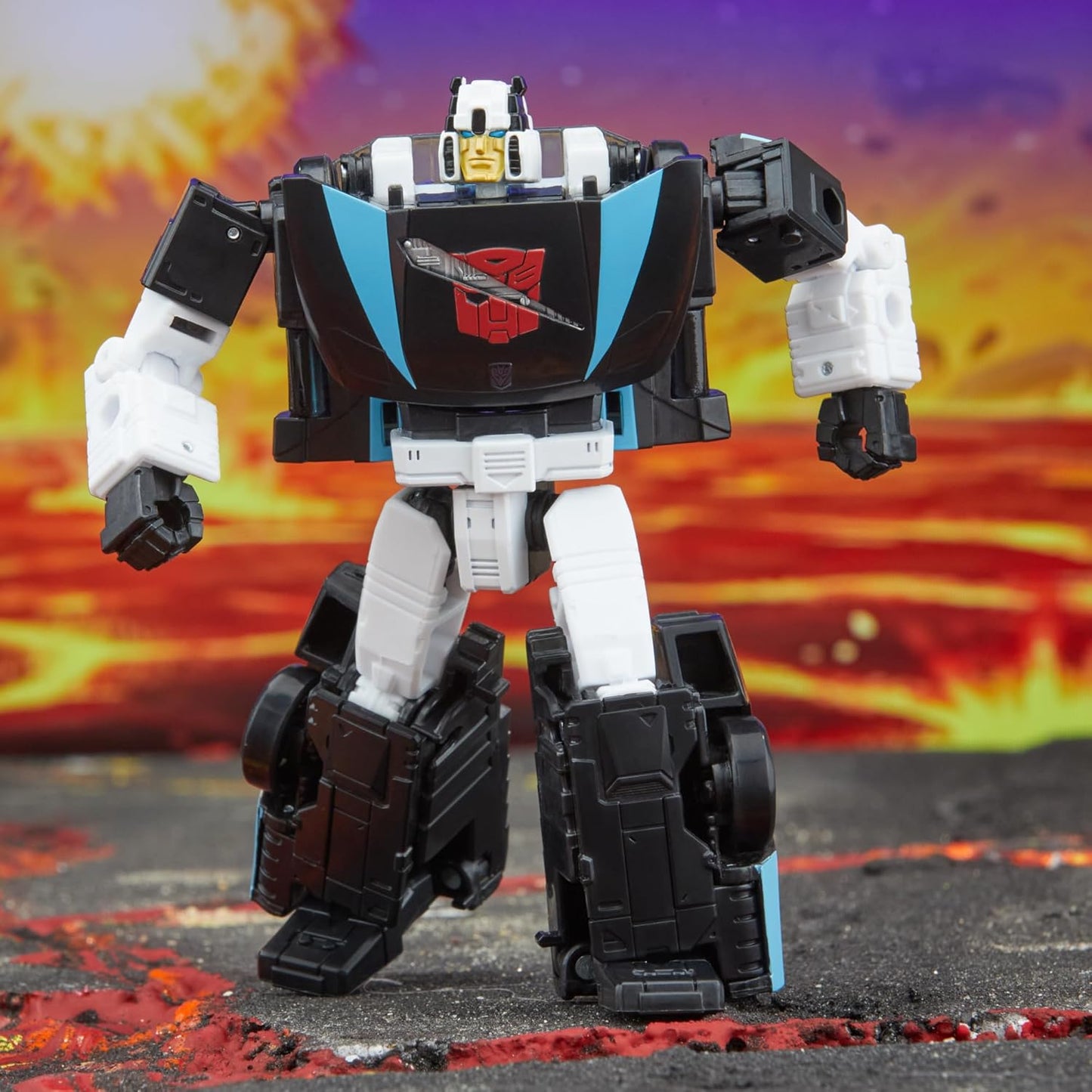 Figura de ação Wheeljack da classe Deluxe de Transformers Legacy do universo Armada
