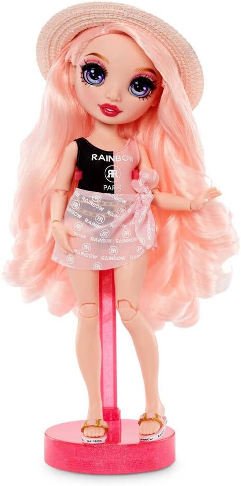 Rainbow High Pacific Coast - Bella Parker - Boneca Fashion Rosa com Roupa, Pernas Intercambiáveis e Suporte de Exibição - Inclui Toalha, Bolsa e Mais - Presente e Item de Colecionador para Crianças a partir de 6 Anos