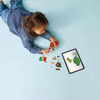 LEGO Animal Crossing Casa Aconchegante da Goldie - Inclui minifigura, piano, mesa de piquenique e acessórios de comida de brinquedo - Presente perfeito para crianças a partir de 6 anos - 77058