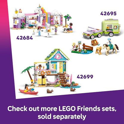 LEGO Friends Dia Divertido no Parque Aquático - Conjunto de Brinquedo em Miniatura com Tobogã, 2 Mini Bonecas, 4 Figuras de Animais e Acessórios para Bichinhos de Estimação - Ideia de Presente de Aniversário para Meninas a partir de 6 Anos - 42676