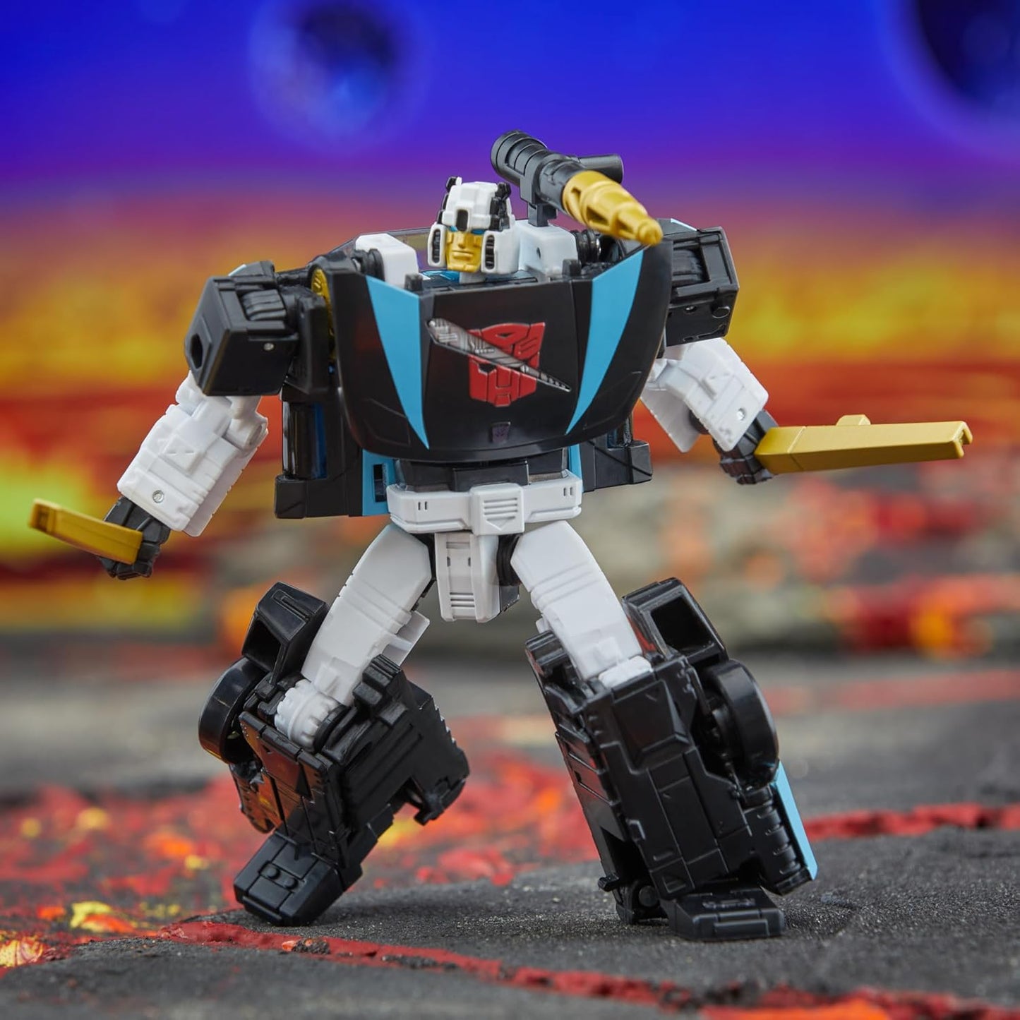 Figura de ação Wheeljack da classe Deluxe de Transformers Legacy do universo Armada