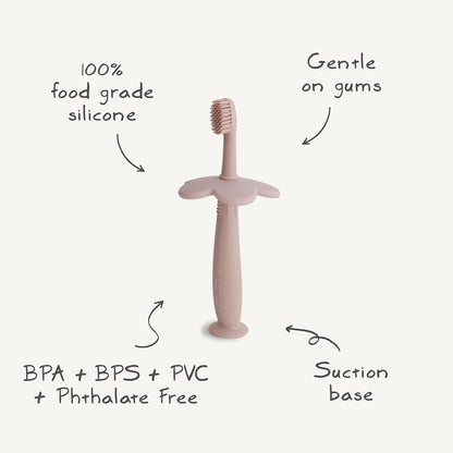 Mushie Escova de dentes de treinamento em silicone, para bebês e crianças pequenas, com base de sucção para fácil armazenamento e treinamento, material: silicone de qualidade alimentar, design de flor (narciso claro).