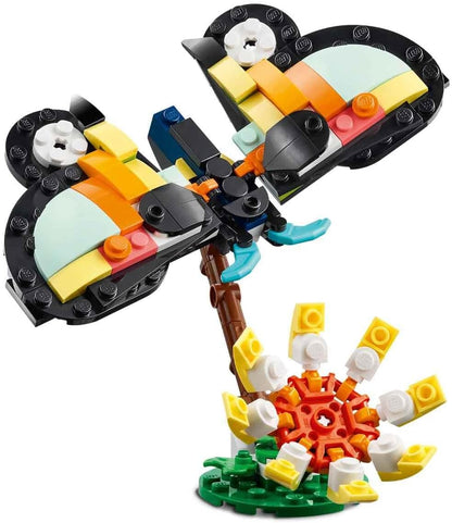 LEGO Creator 3 em 1 Animais Selvagens: Tucano Tropical com Flor - Animal de Brinquedo que se Transforma em uma Borboleta ou um Peixe Tropical - Presente Criativo para Meninas e Meninos a partir de 7 Anos - 31173