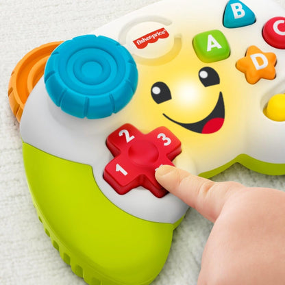 Fisher-Price Controle de jogo educativo e divertido para bebês e crianças pequenas, videogame de brinquedo com música e luz para bebês a partir de 6 meses, versão multilíngue.