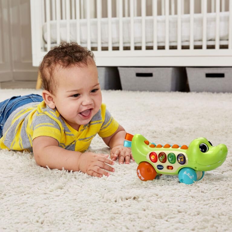 VTech Baby Squishy Spikes Alligator, brinquedo para bebê push along com 4 botões interativos, luzes, sons, cores e músicas, brinquedo sensorial com texturas, presente para bebês de 6, 9, 12, 18 meses +, versão em inglês