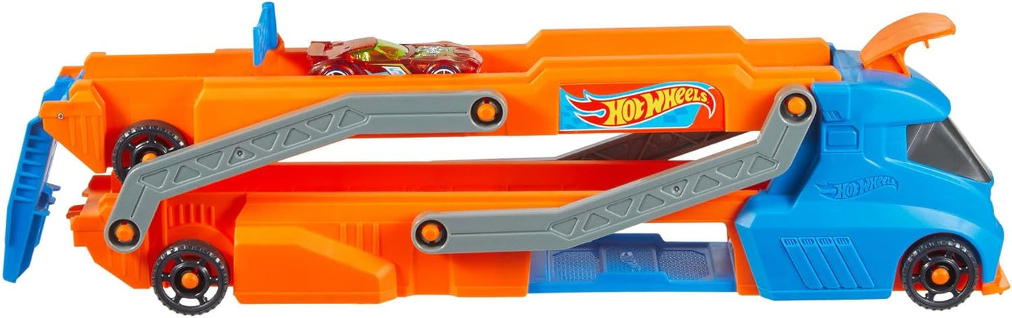 Hot Wheels Conjunto com carrinho, caminhão, reboque e pista em escala 1:64. O caminhão grande se transforma em uma pista de corrida de aproximadamente 76 cm com lançador, armazena até 9 carrinhos em escala 1:64 e conecta-se a outros conjuntos. HYT83