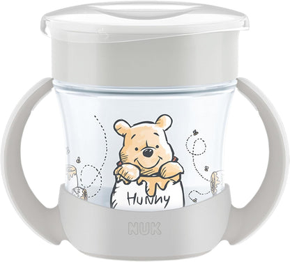 NUK Copo de Treinamento Mini Magic Cup | 6+ meses | 160 ml | Borda 360° antivazamento | Copo para crianças pequenas com alças antiderrapantes | Disney Ursinho Pooh | 1 unidade