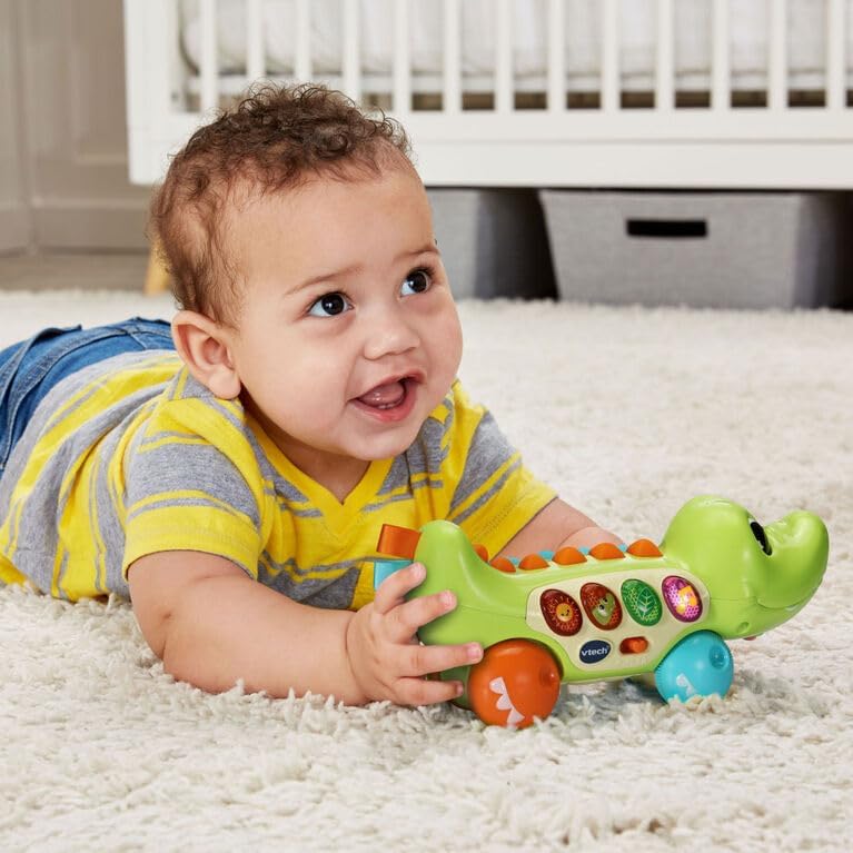 VTech Baby Squishy Spikes Alligator, brinquedo para bebê push along com 4 botões interativos, luzes, sons, cores e músicas, brinquedo sensorial com texturas, presente para bebês de 6, 9, 12, 18 meses +, versão em inglês