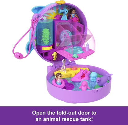 Polly Pocket Dolls and Playset, Dolphin Rescue & Play Compact, Animal Toy with 2 Micro Dolls, Sea Pets, Ocean Accessories