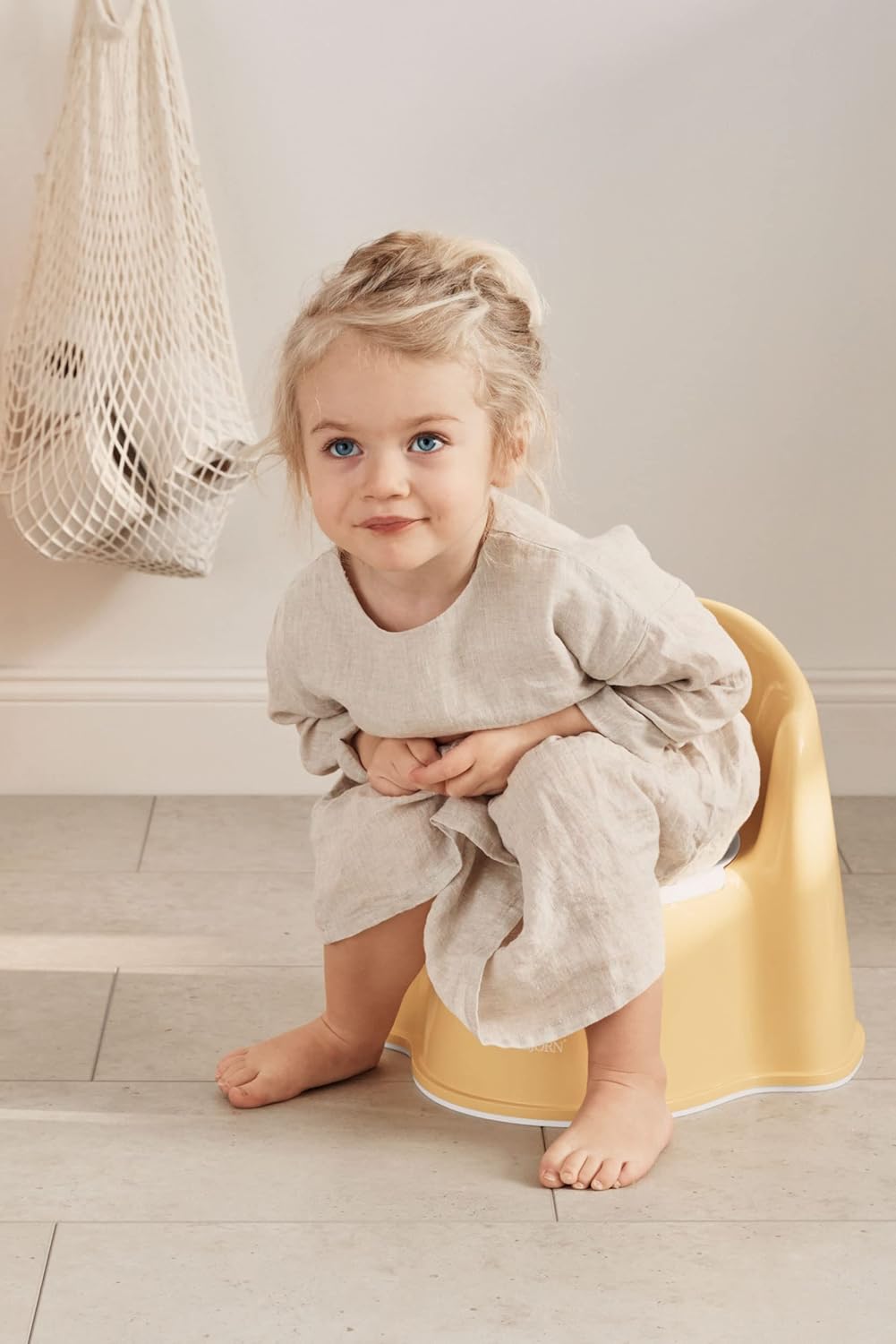 BabyBjörn  Cadeira potty, pó amarelo/branco