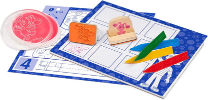 ¡Las pistas de Melissa y Doug Blue y tú! Sellos con mango de madera y bloc de actividades.