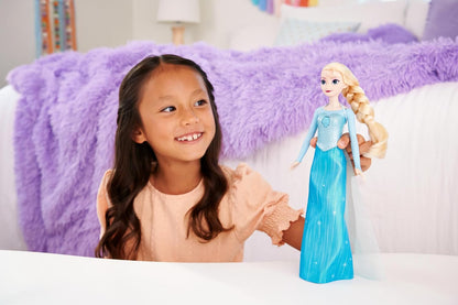 Mattel Boneca Disney Frozen Elsa que Canta "Let It Go" em 4 Idiomas | Boneca Fashion Musical Articulada que Canta em Inglês, Alemão, Italiano e Francês e Vem com Saia e Sapatos Removíveis, JDL58