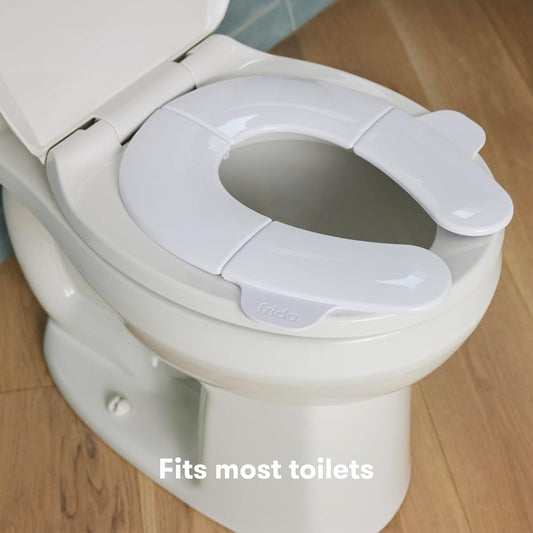Frida Baby Fold-and-Go Assento de penico dobrável | Assento de penico portátil dobrável para meninos e meninas, compatível com vasos sanitários redondos e ovais