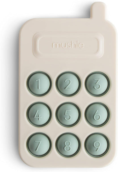 Mushie Brinquedo de apertar | Brinquedo sensorial antiestresse com bolhas | A partir de 10 meses | Brinquedo para aliviar o estresse | 100% silicone de qualidade alimentar e plástico ABS | Design de telefone
