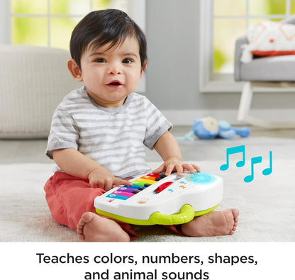Piano de brinquedo Fisher-Price Silly Sounds com luzes - Edição em inglês do Reino Unido, piano portátil com luzes, notas musicais reais e músicas educativas para bebês e crianças pequenas, GFK04