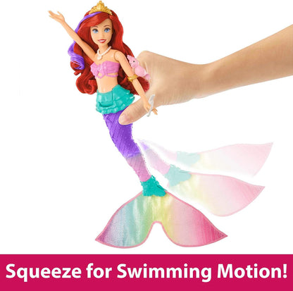 Mattel Boneca Disney Princess Ariel Sereia Nadadora | Boneca articulada com cabelo e cauda que mudam de cor, movimentos de natação e brincadeira com água inspirados no filme "A Pequena Sereia" da Disney, HPD43