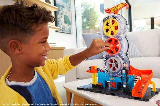 Hot Wheels City Super Twist Tire Shop Set de juego, gira la llave para hacer que los autos viajen sobre neumáticos, incluye 1 auto Hot Wheels, regalo para niños de 4 a 8 años, HDP02