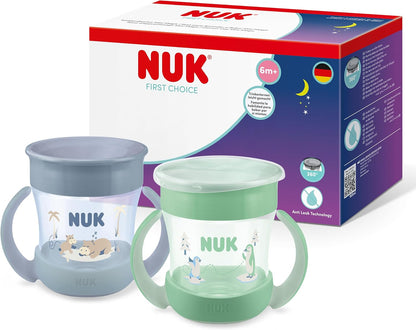 NUK Conjunto de Copos Mini Magic Cup | 6+ meses | 160 ml | Borda 360° antivazamento | Copo de transição com alças antiderrapantes | Modelos padrão e que brilham no escuro | Temas Hipopótamo e Pinguim | Kit com 2 unidades