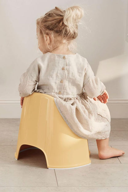 BabyBjörn  Cadeira potty, pó amarelo/branco
