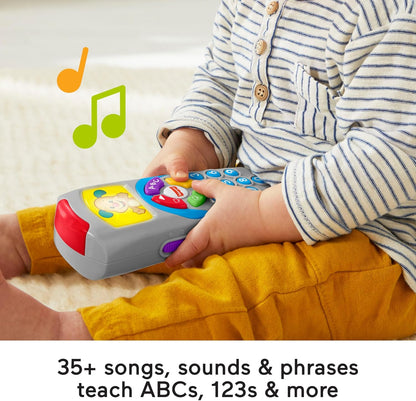 Controle remoto Fisher-Price Laugh and Learn, tela iluminada, versão em inglês do Reino Unido, botões e mais de 35 músicas, melodias e frases para cantar junto. Brinquedo educativo para bebês, desenvolvimento infantil. Versão em inglês DLD30