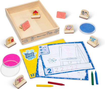 ¡Las pistas de Melissa y Doug Blue y tú! Sellos con mango de madera y bloc de actividades.