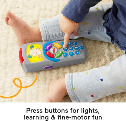 Controle remoto Fisher-Price Laugh and Learn, tela iluminada, versão em inglês do Reino Unido, botões e mais de 35 músicas, melodias e frases para cantar junto. Brinquedo educativo para bebês, desenvolvimento infantil. Versão em inglês DLD30