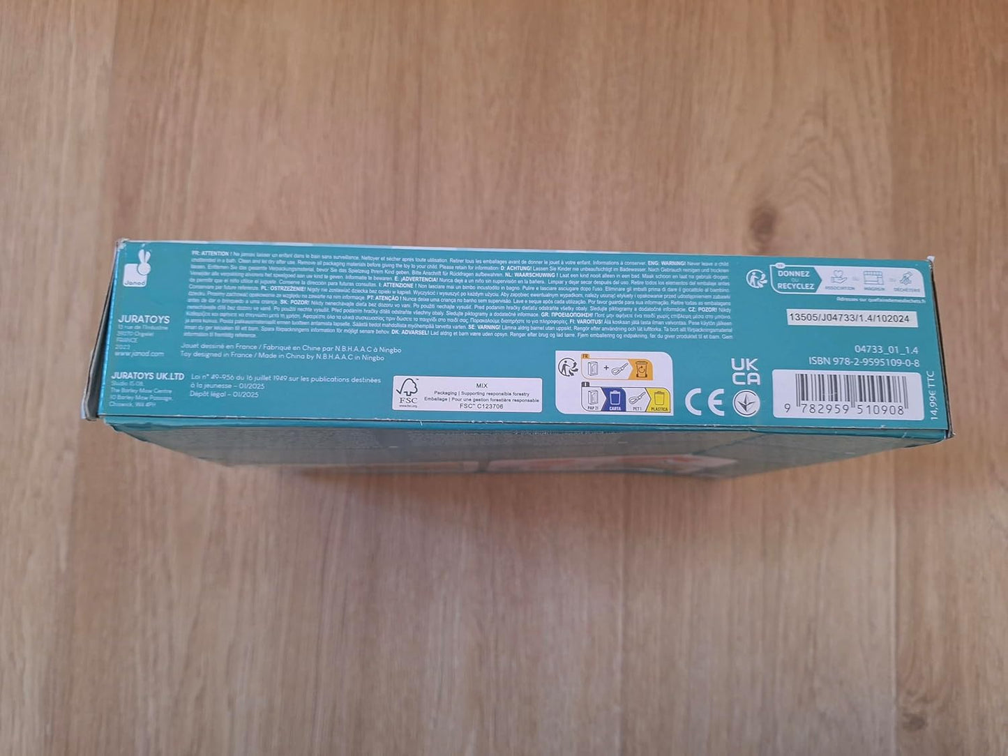 Janod - Livro de banho interativo com 3 brinquedos de aspersão incluídos - 1 livro + 3 aspersores - Desenvolve habilidades motoras finas - Fácil de limpar - A partir de 10 meses - J04733