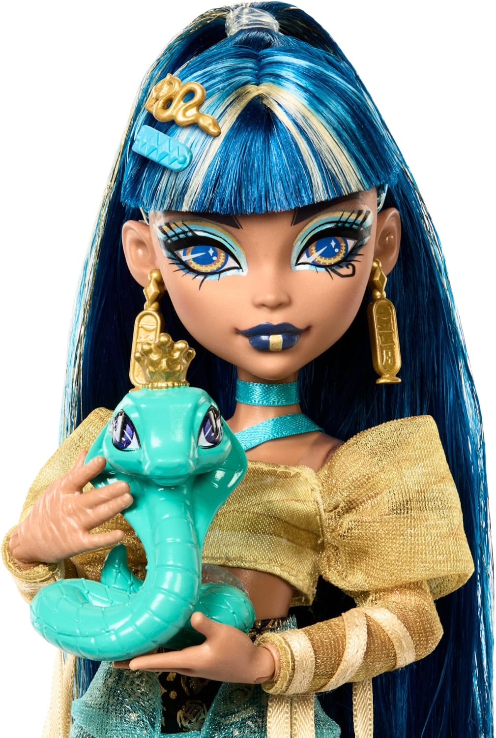 Monster High Boneca Cleo De Nile com blusa dourada e saia em camadas, inclui cobra de estimação Hissette e acessórios como mochila, lanche e pergaminho, HXH74