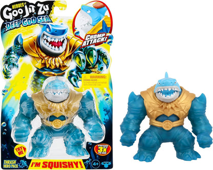 Heróis de Goo Jit Zu Deep Goo Sea Thrash Hero Pack. Brinquedo super macio e cheio de gosma. Com função de ataque de mordida. Estique-o até 3 vezes o seu tamanho!