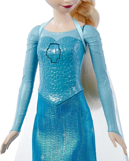 Mattel Boneca Disney Frozen Elsa que Canta – Canta "Let It Go" em Inglês | Boneca Fashion Musical Articulada com seu Vestido Azul Característico, Saia e Sapatos Removíveis e Cabelo Trançado – Inspirada no Filme – JFH84