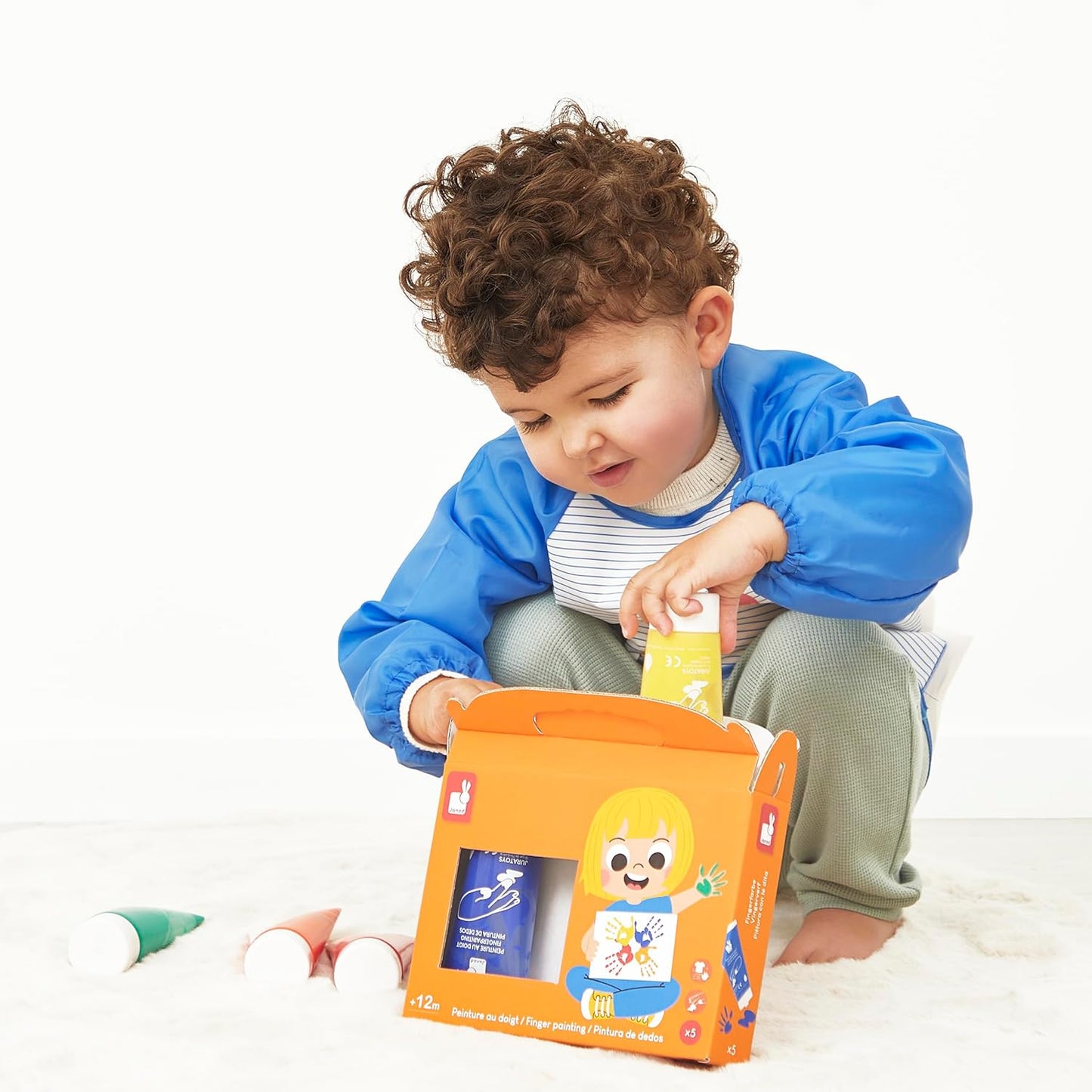 Janod - Pincéis - 4 tamanhos diferentes - Pincéis, Janod - Tintas para dedos para bebês a partir de 1 ano, Janod - Paleta de tinta à base de água - 12 almofadas e pincel, Janod - Avental de pintura infantil a partir de 18 meses