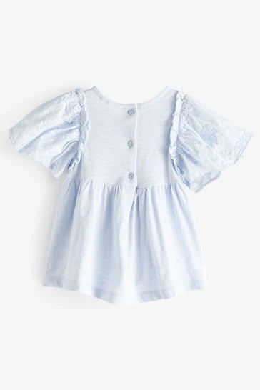 |Girl| T-Shirt Bordada Manga Curta - Flor Azul (3 meses-7 anos)