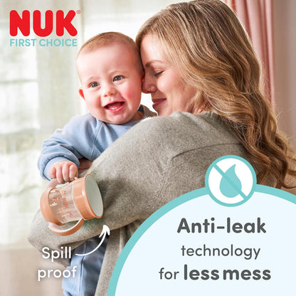 NUK Conjunto de Copos Mini Magic Cup | 6+ meses | 160 ml | Borda 360° antivazamento | Copo de transição com alças antiderrapantes | Modelos padrão e que brilham no escuro | Temas Hipopótamo e Pinguim | Kit com 2 unidades