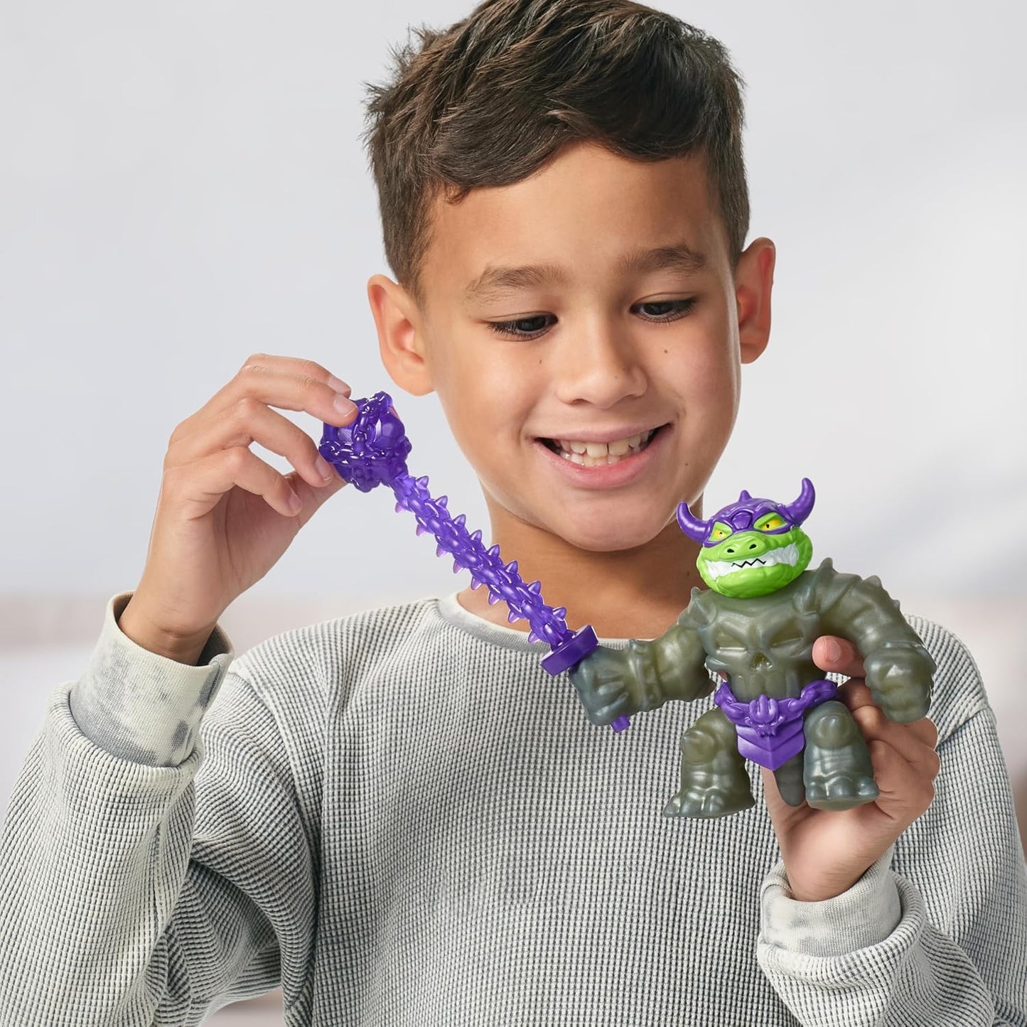 Heróis de Goo Jit Zu Stretch Strikers Deluxe Hero Pack Rock Jaw, Figura de Ação Elástica com Mais de 20 Sons de Batalha Incríveis