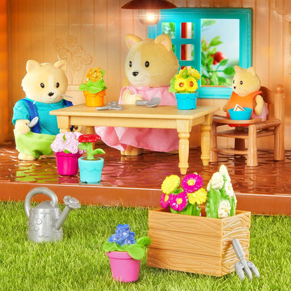 Li'l Woodzeez - Familia de gatos Whiskerelli - Juego de juguetes de 5 piezas con figuras de animales en miniatura y libro de cuentos - Juguetes y accesorios de animales para niños a partir de 3 años