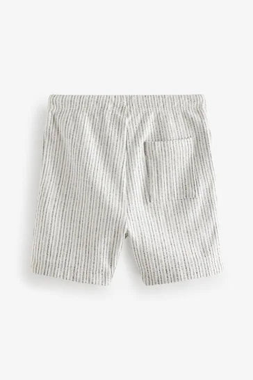 |Boy| Shorts Jersey Listrado Preto/Branco (3 Meses A 7 Anos)