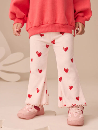 |Girl| Legging Flare Rosa Claro com Coração e Canelado (3 meses a 7 anos)