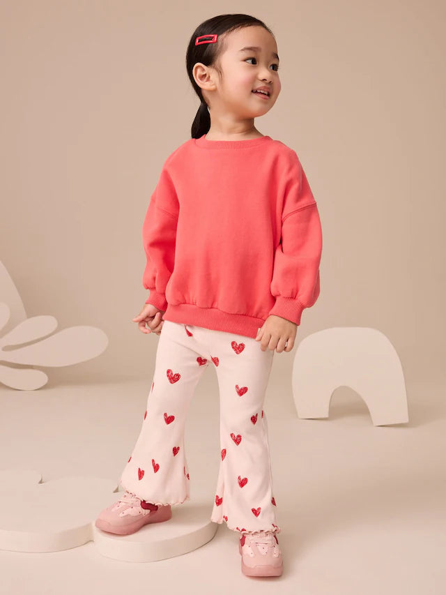 |Girl| Legging Flare Rosa Claro com Coração e Canelado (3 meses a 7 anos)