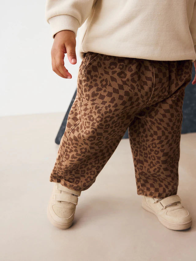 |Boy| Calças Largas Com Estampa De Leopardo Bege (3 meses a 7 anos)